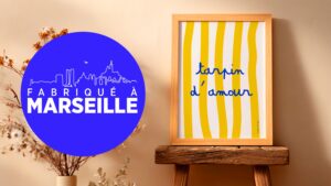 cadre expression marseillaise "tarpin d'amour" sur lignes jaunes avec le label fabriqué à marseille